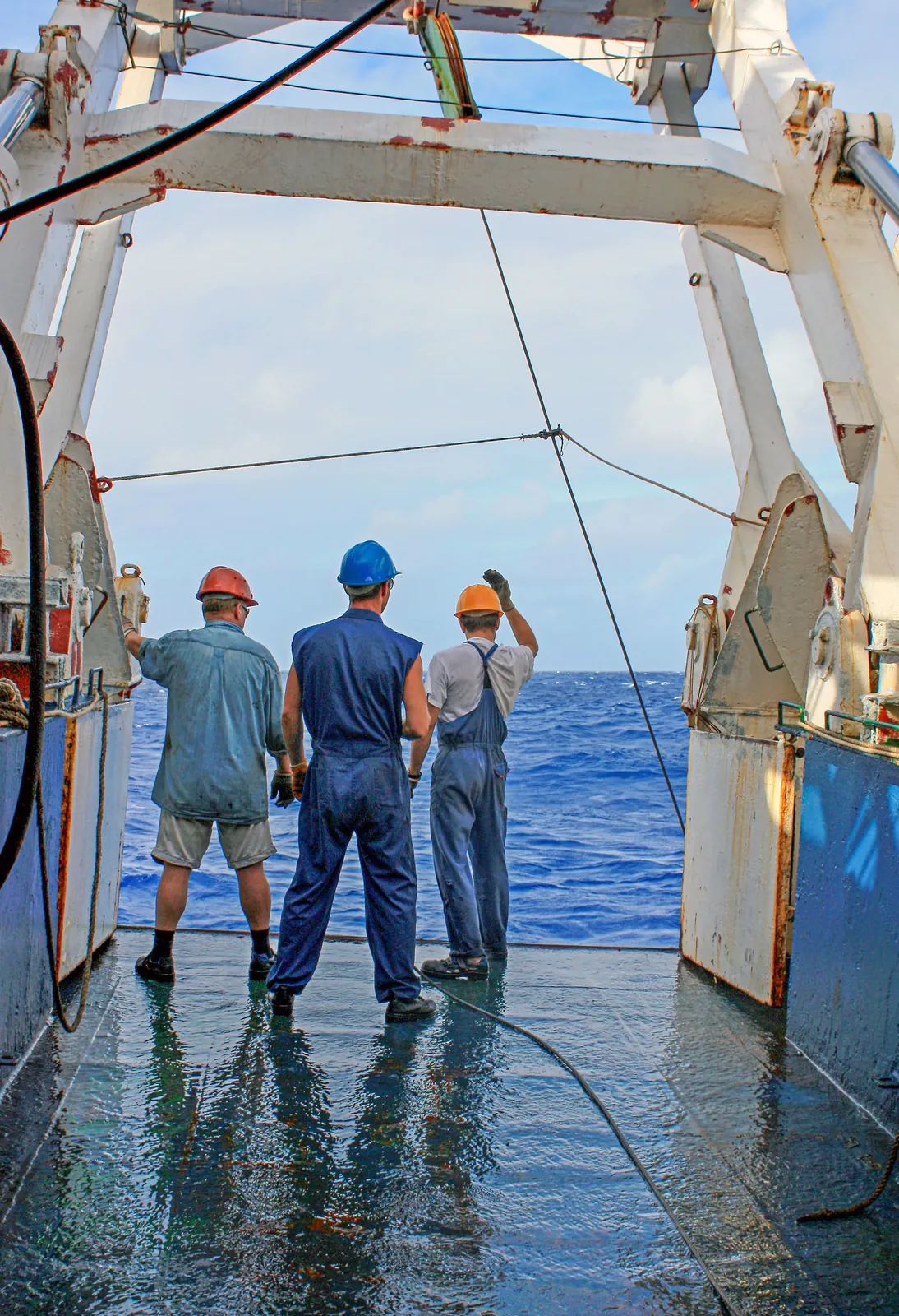 Seafarers working on a vessel deck
